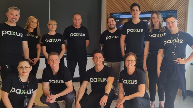 Team spirit on display: a cohesive group of professionals in matching company t-shirts, ready to tackle their next project with enthusiasm.
