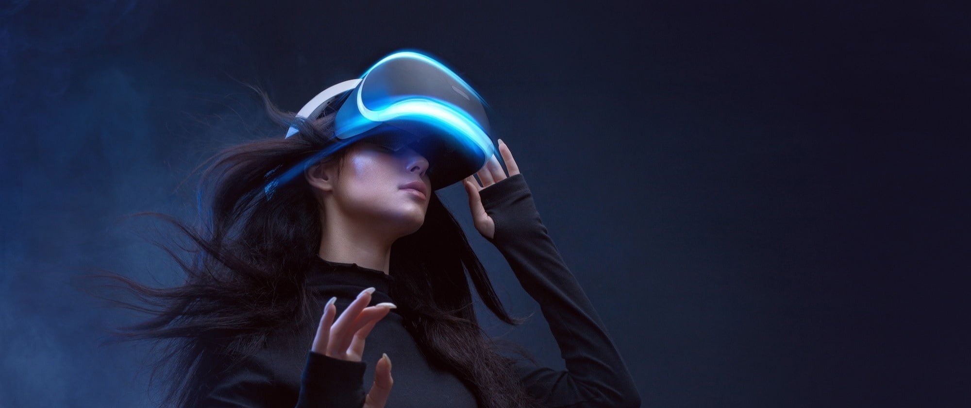 Exploring new realities: a woman immersed in a virtual world through vr technology.
