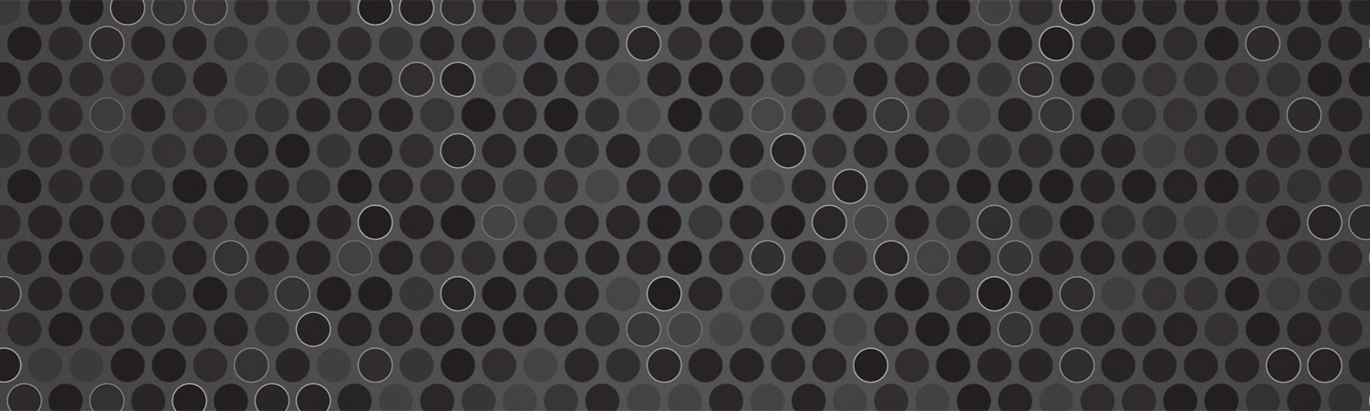 An abstract pattern of overlapping circles in shades of gray, creating a metallic mesh-like texture.